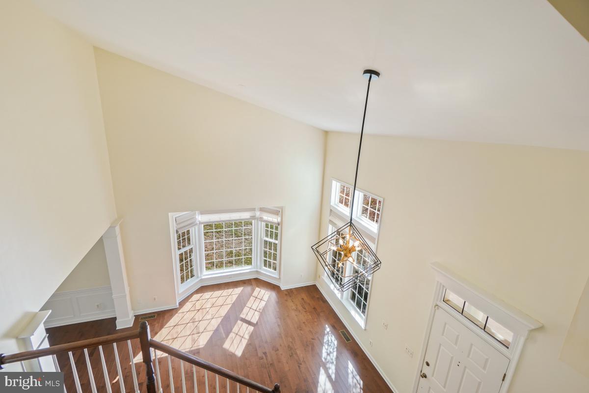 2442 Arctic Fox Way Reston, VA 20191 - Photo 26 of 58 a view of a hallway with windows