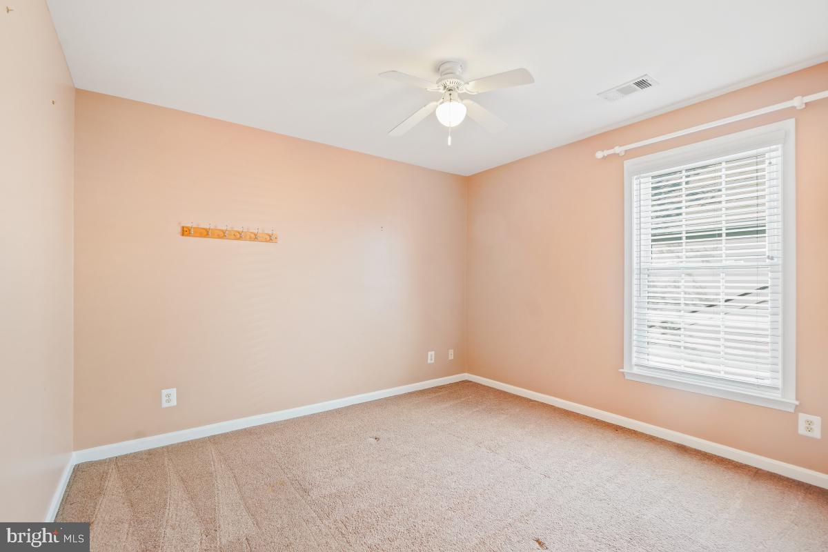 2442 Arctic Fox Way Reston, VA 20191 - Photo 37 of 58 an empty room with a window