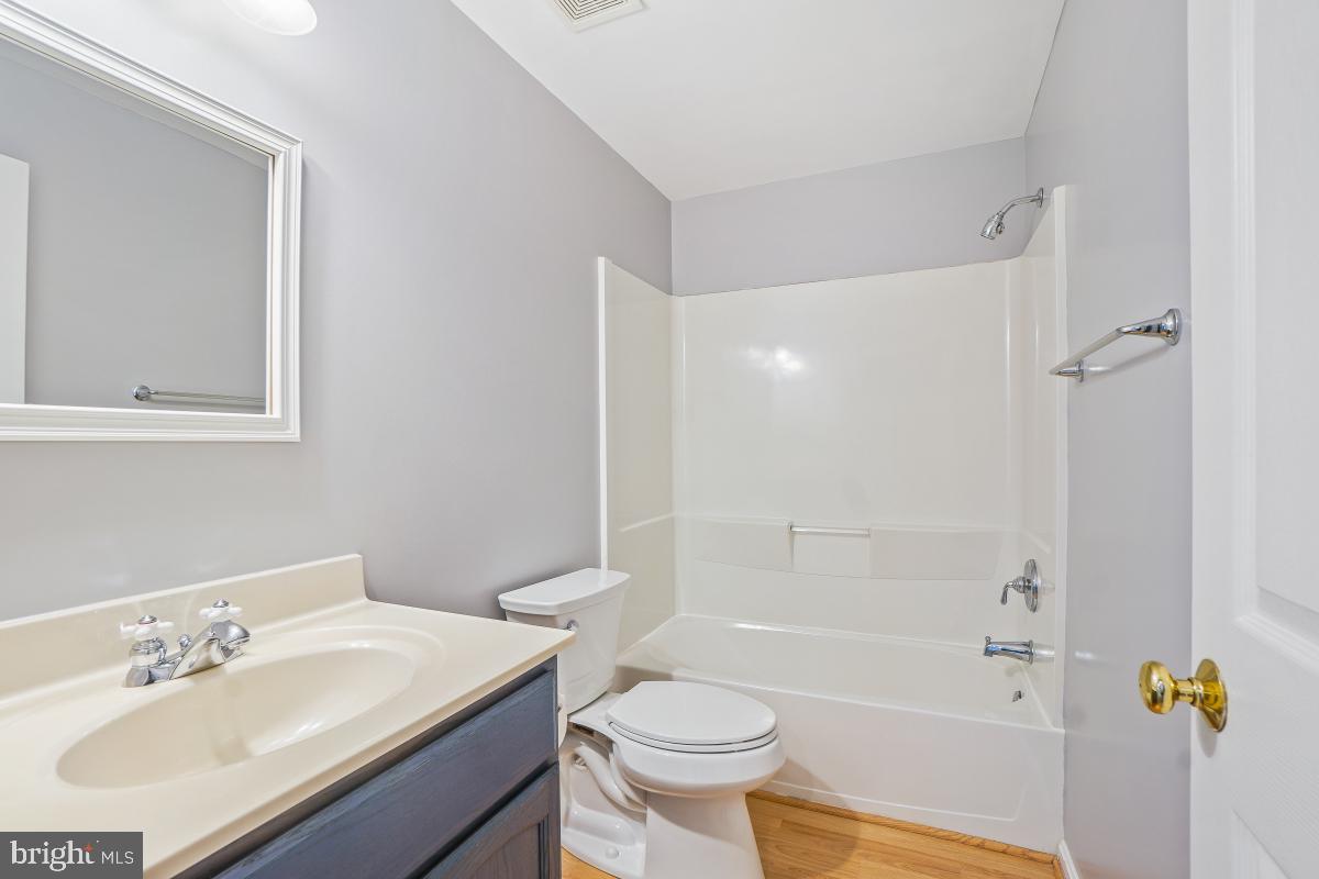 2442 Arctic Fox Way Reston, VA 20191 - Photo 46 of 58 a bathroom with a sink toilet and shower