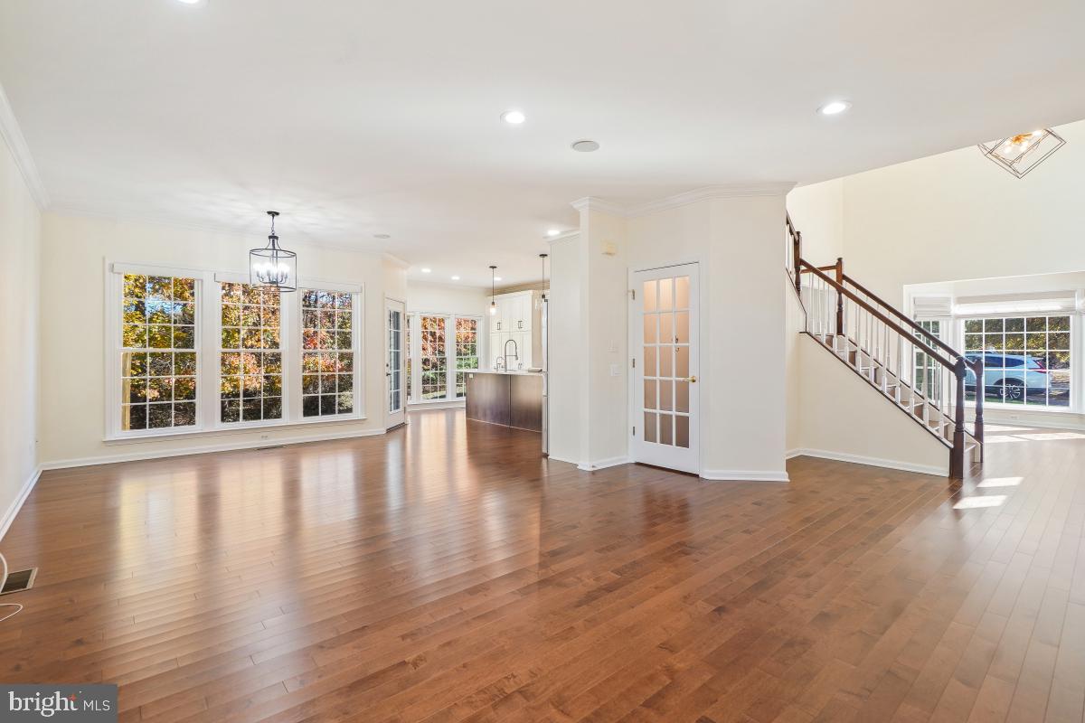 2442 Arctic Fox Way Reston, VA 20191 - Photo 9 of 58 a view of an entryway with wooden floor