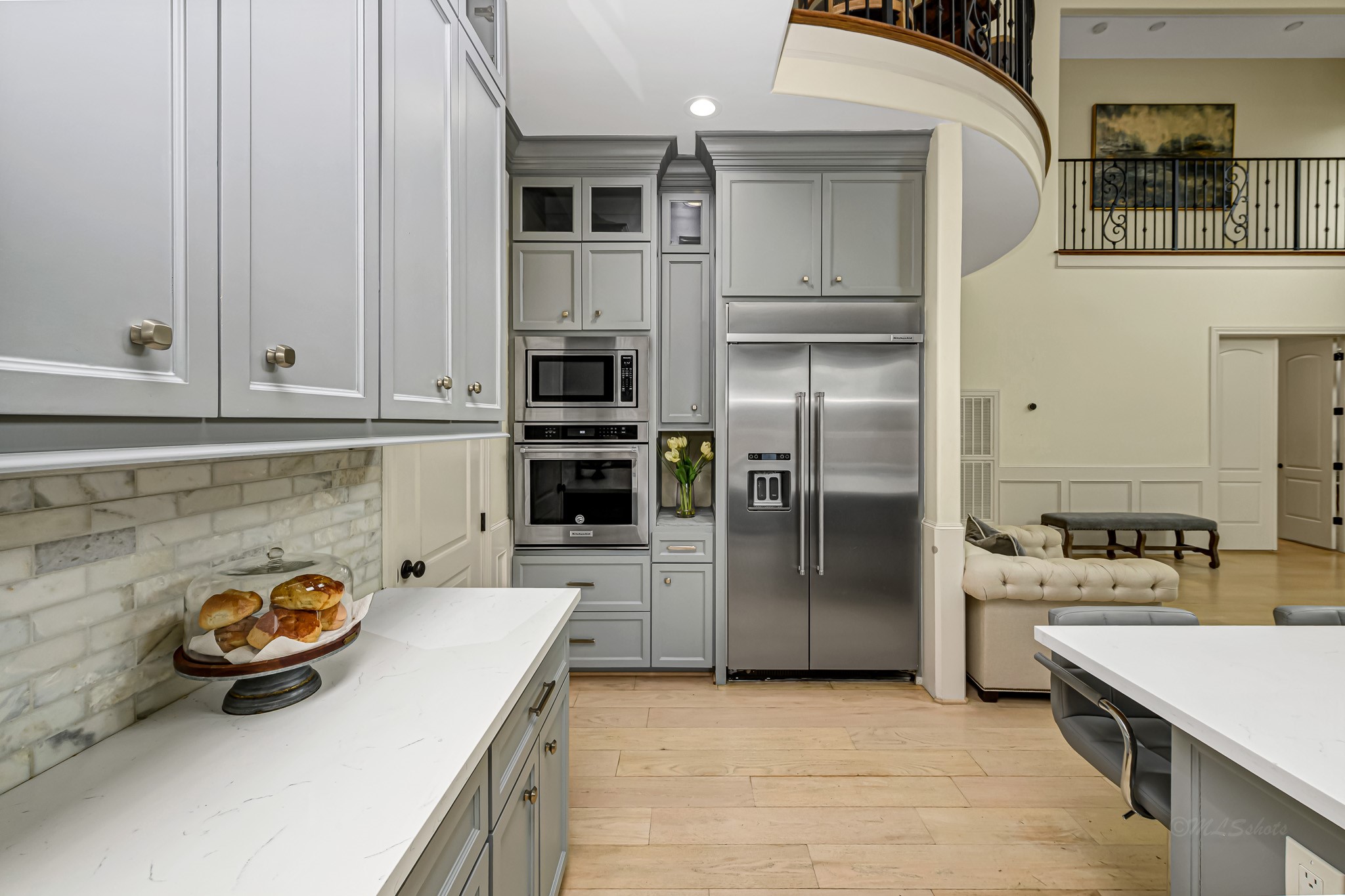 1340 Idylwild Street Houston, TX 77009 - Photo 12 of 42 Gorgeous quartz countertops are nicely accented by the tumbled stone backsplash