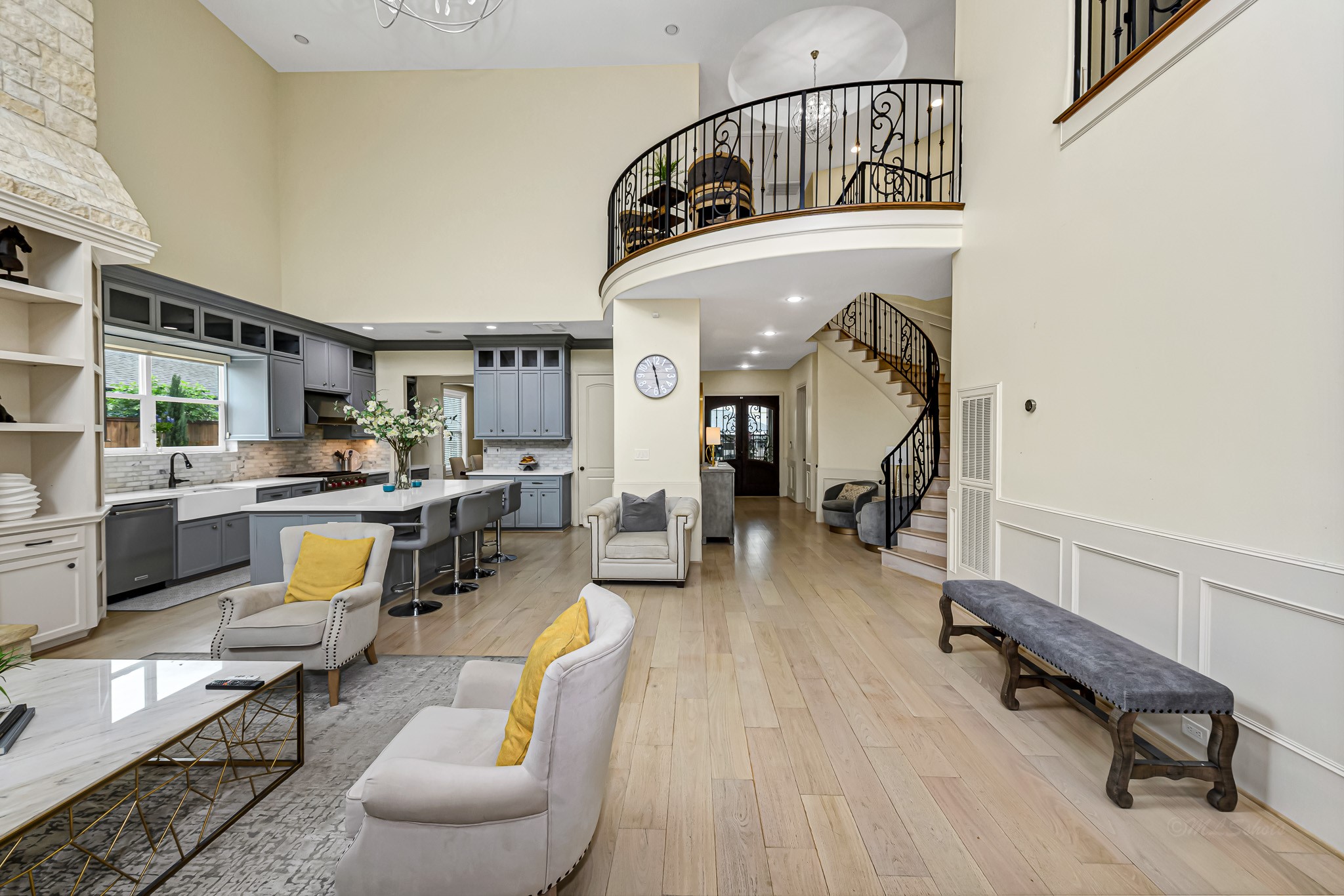 1340 Idylwild Street Houston, TX 77009 - Photo 20 of 42 The spiral staircase is a dramatic architectural feature that combines elegance and artistry, drawing the eye upward as it twists gracefully toward the upper level