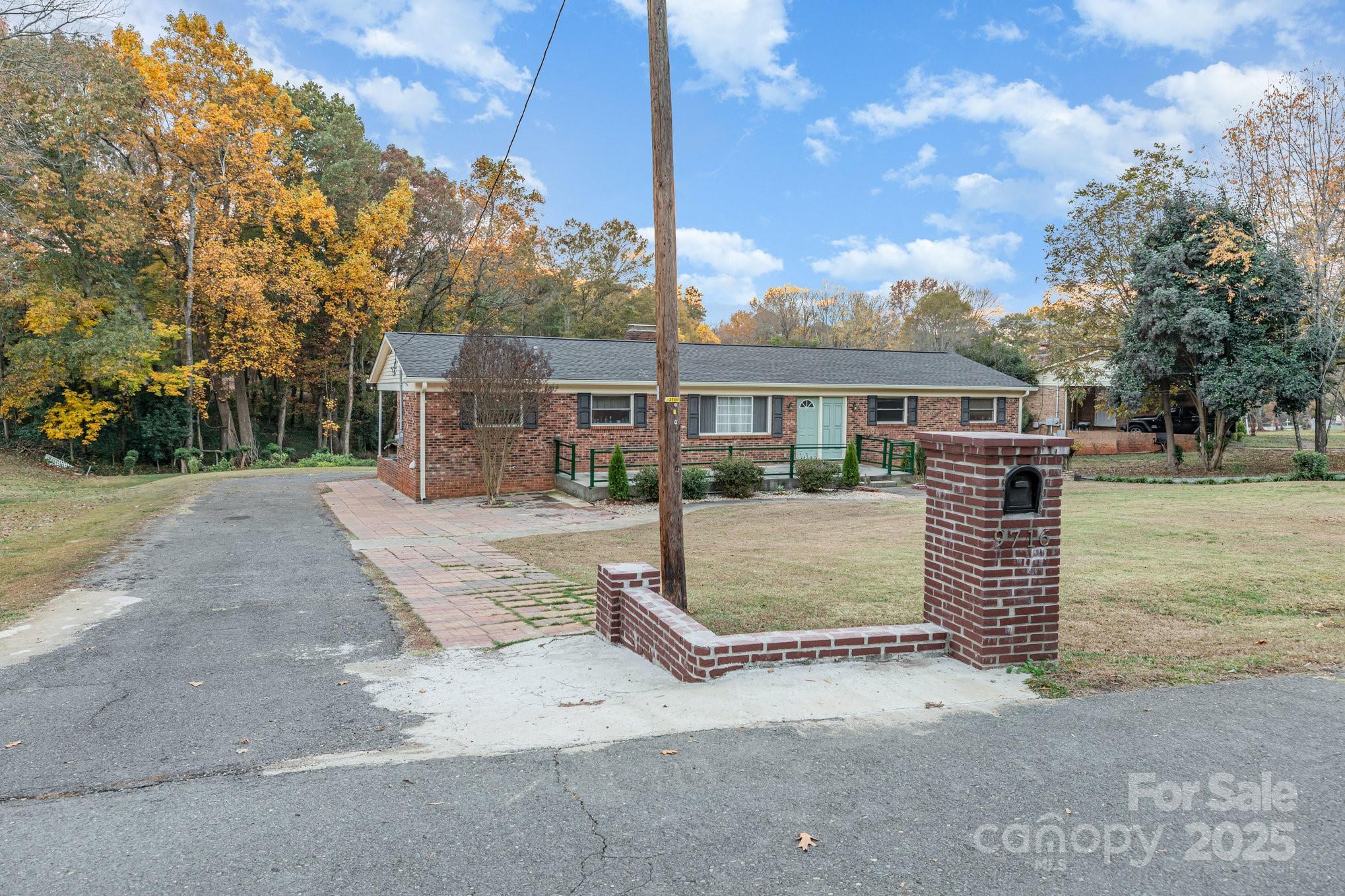 9716 Sunway Drive Mint Hill, NC 28227 - Photo 2 of 31 front view of a house with a street