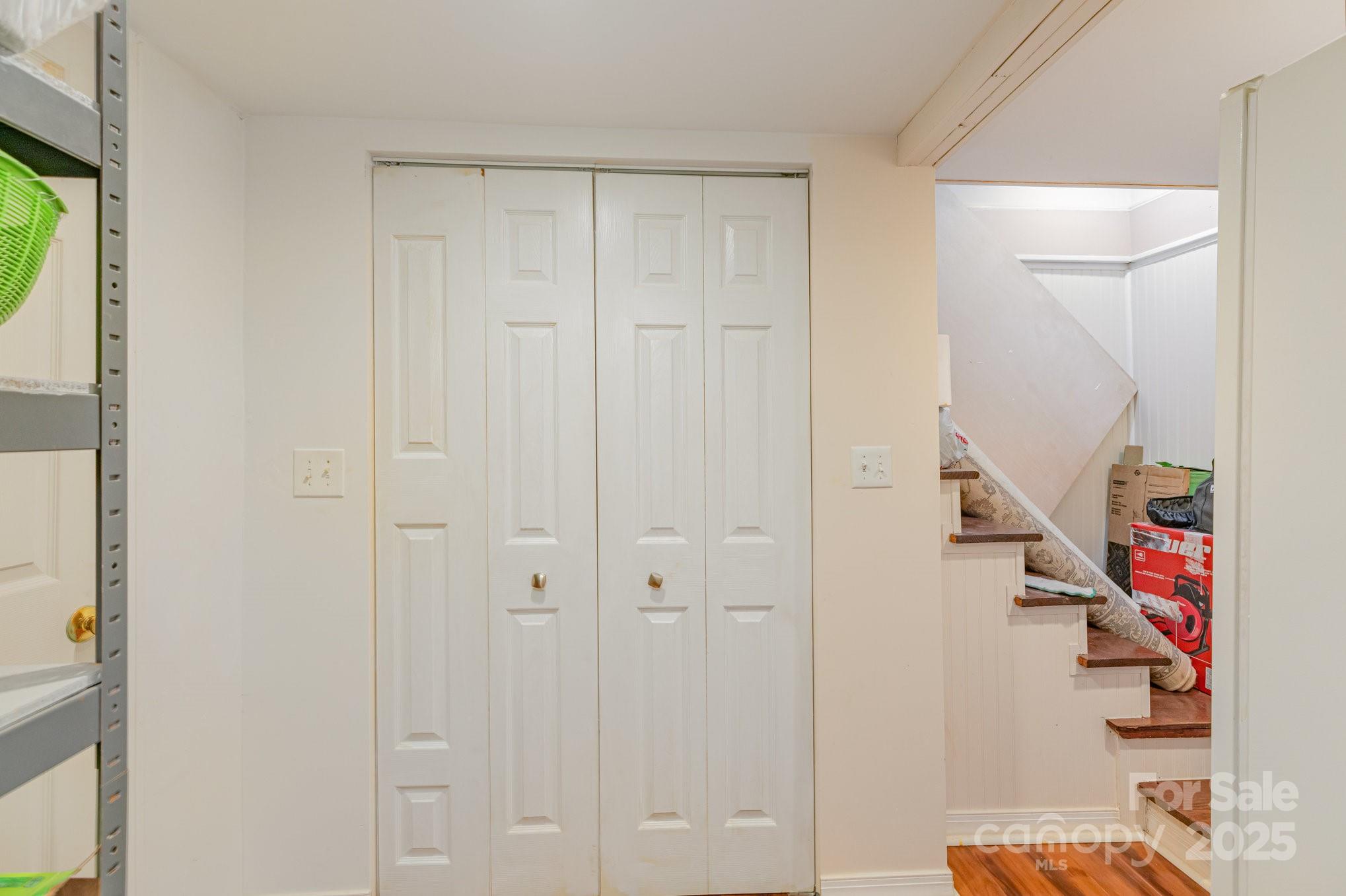 9716 Sunway Drive Mint Hill, NC 28227 - Photo 27 of 31 a view of entryway with wooden floor and stairs