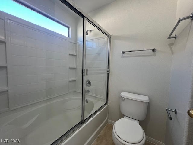 8229 Strawberry Spring Street Las Vegas, NV 89143 - Photo 28 of 40 Bathroom featuring enclosed tub / shower combo and light tile patterned floors