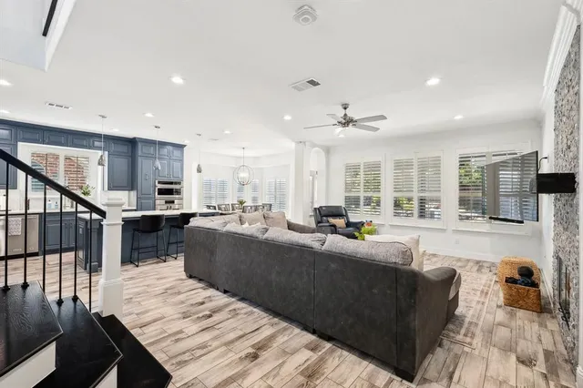 a living room with furniture and a table