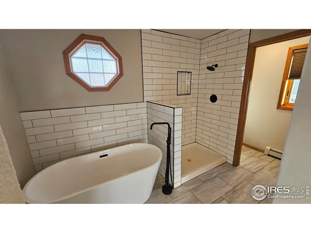 a black and white photo of a living room