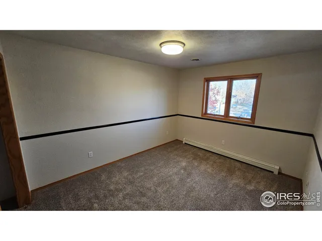 a view of a room with a bathroom