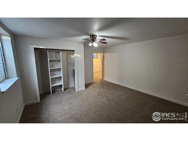 a black and white photo of a living room