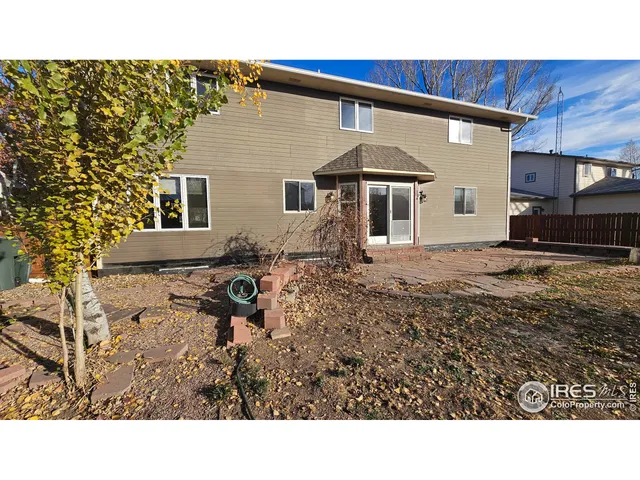 a black and white photo of a house