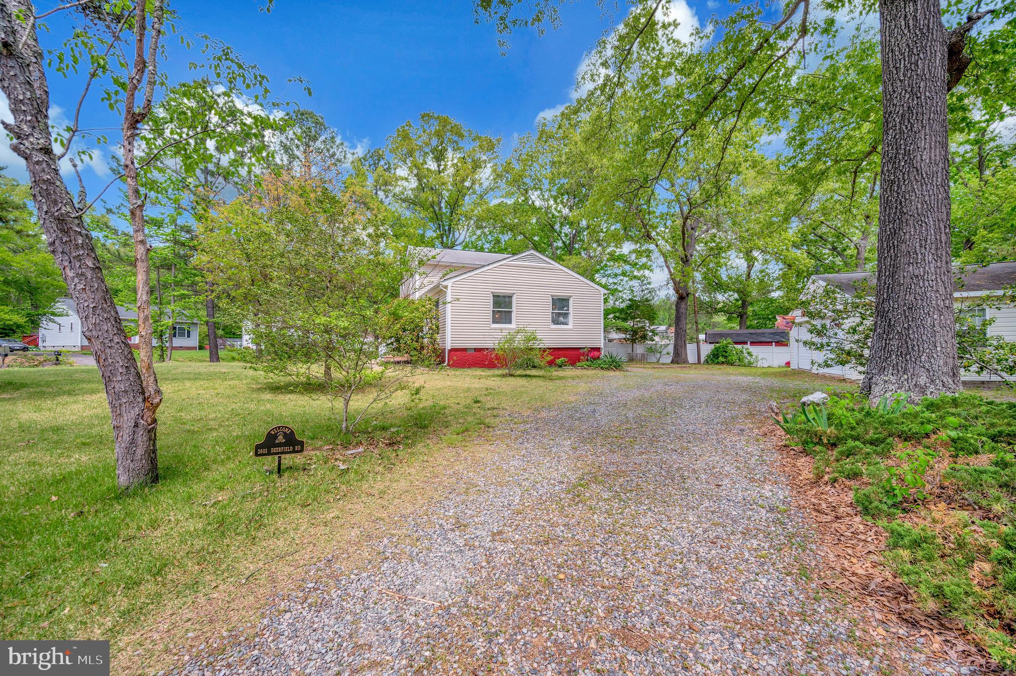 2601 Deerfield Road Ruther Glen, VA 22546 - Photo 2 of 51 Gravel driveway and side yard access