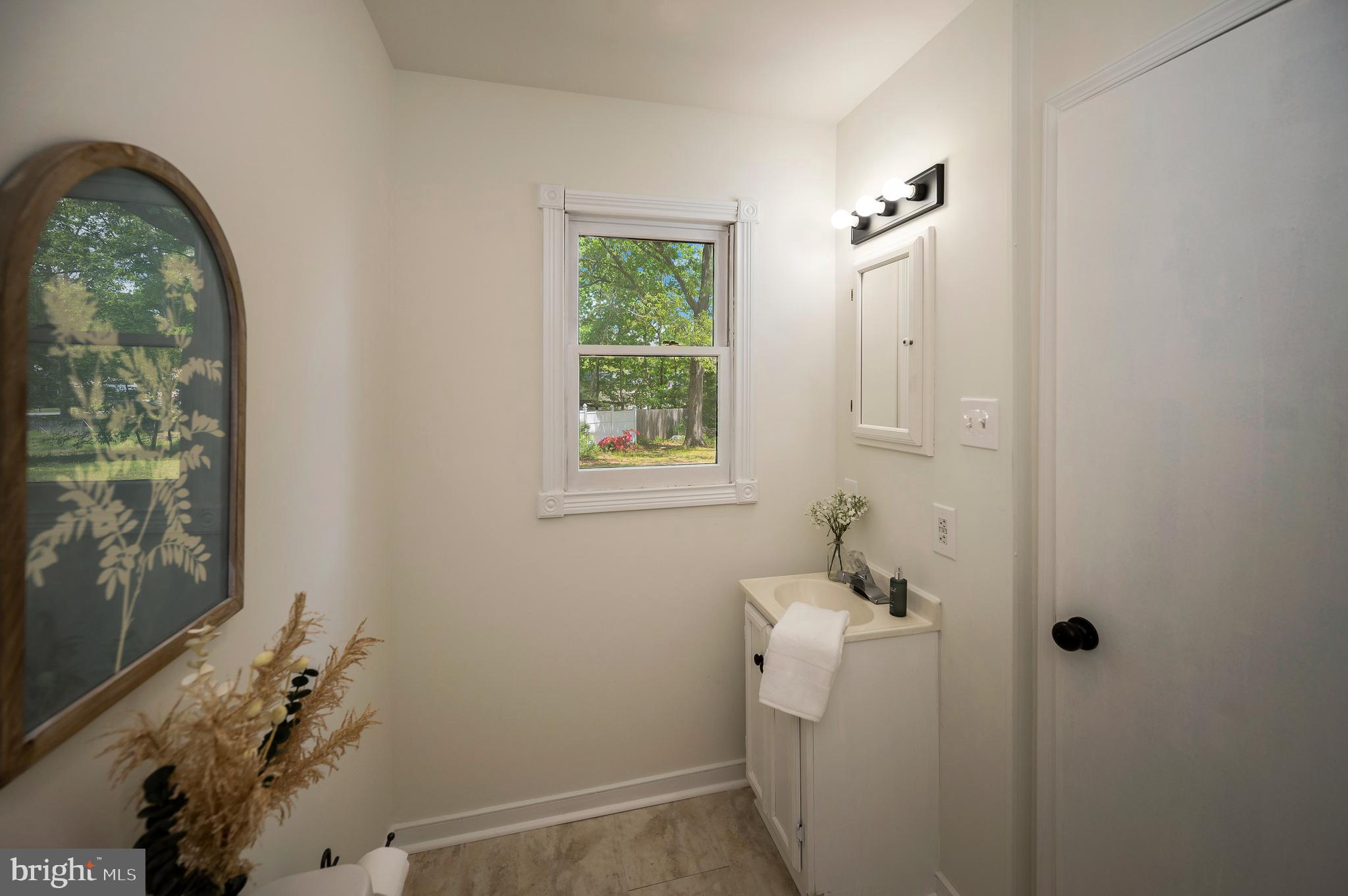 2601 Deerfield Road Ruther Glen, VA 22546 - Photo 36 of 51 Bright half bath with a backyard view