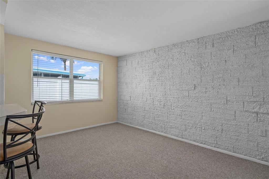 7403 Populus Drive Port Richey, FL 34668 - Photo 19 of 50 a view of an empty room with a window