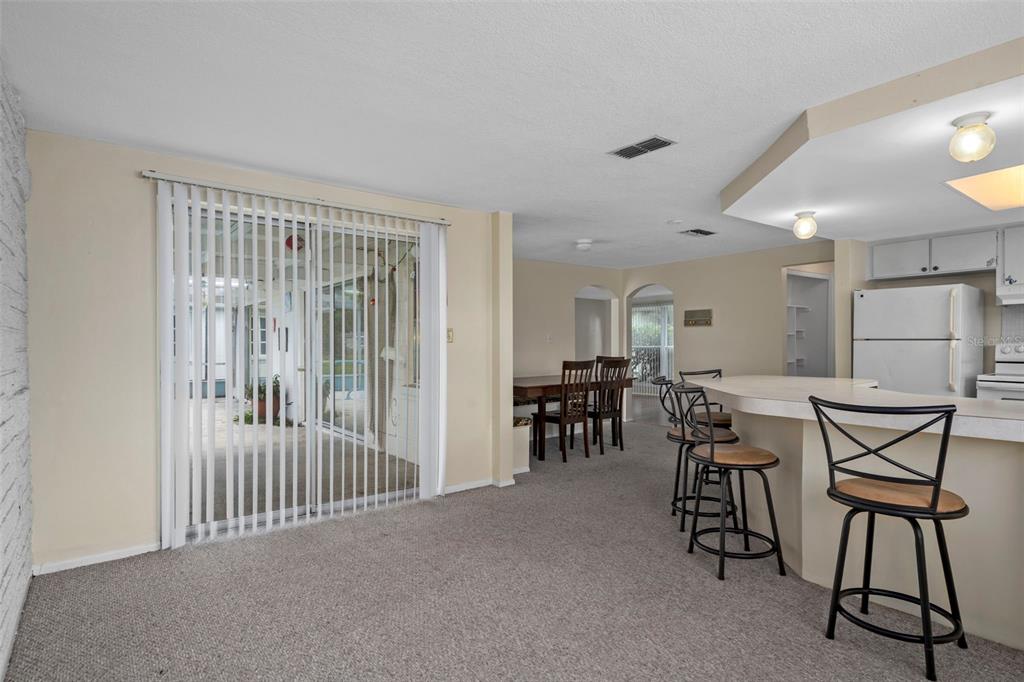 7403 Populus Drive Port Richey, FL 34668 - Photo 21 of 50 a view of a room with furniture and a window