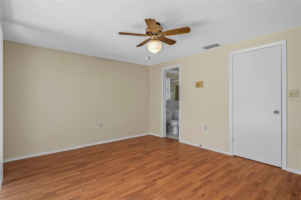 7403 Populus Drive Port Richey, FL 34668 - Photo 30 of 50 a view of empty room with wooden floor