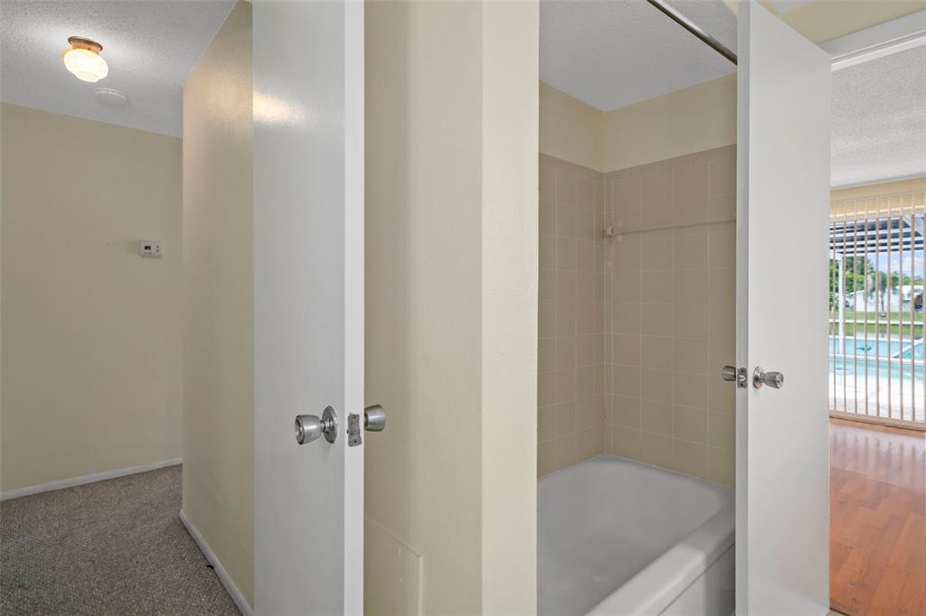 7403 Populus Drive Port Richey, FL 34668 - Photo 34 of 50 a bathroom with a tub