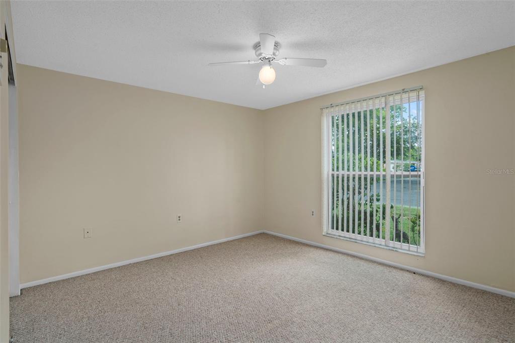 7403 Populus Drive Port Richey, FL 34668 - Photo 39 of 50 a view of an empty room with a window