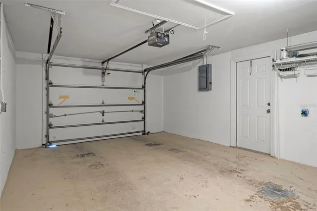 a view of a backyard with swimming pool