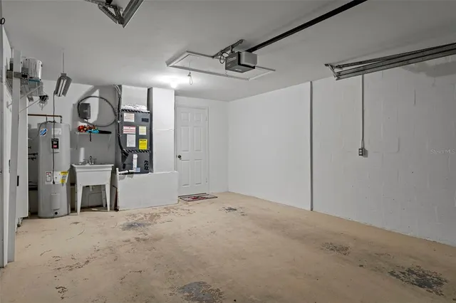 a view of a swimming pool with a bench in front of it