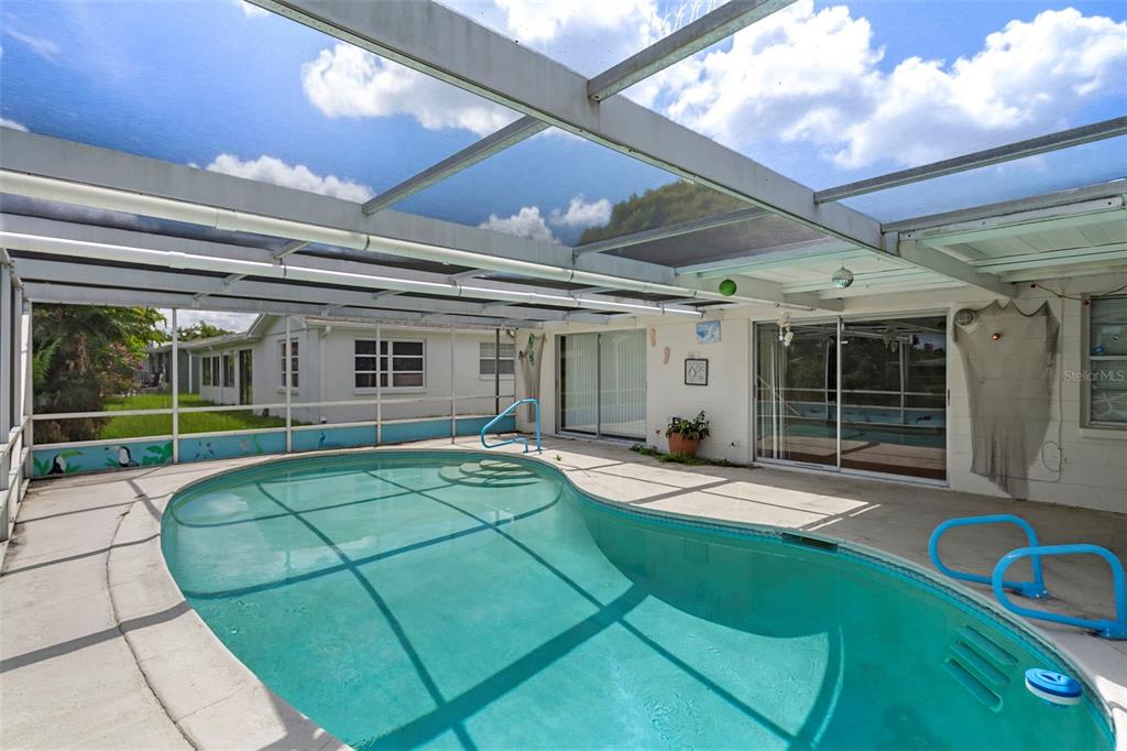 7403 Populus Drive Port Richey, FL 34668 - Photo 46 of 50 a house view with a outdoor space