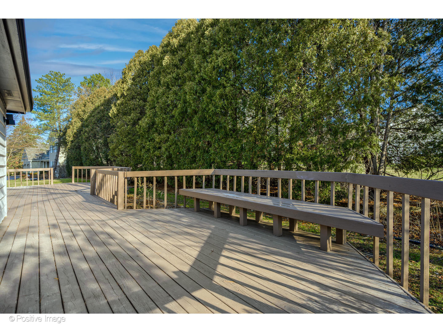 737 Valley Road Lake Forest, IL 60045 - Photo 13 of 17 a view of a wooden deck and a yard