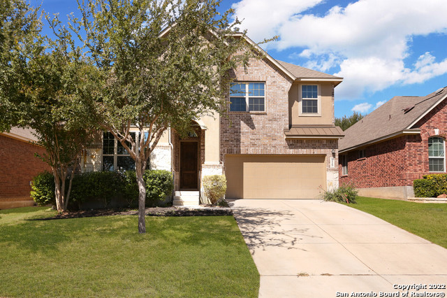 6119 Geranium San Antonio, TX 78253 - Photo 1 of 1 a front view of a house with a yard and garage