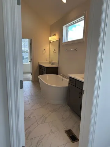 a view of a bathtub in a bathroom