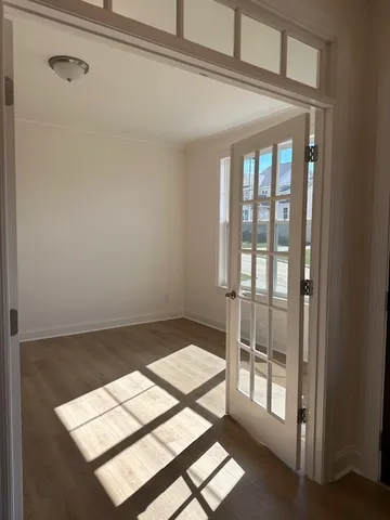 a view of an empty room and window