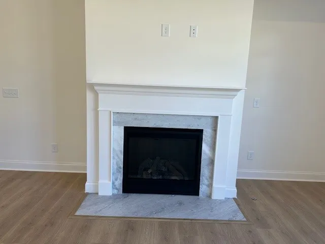 a living room with a fireplace