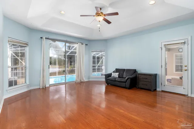 a spacious bathroom with a bathtub sink and toilet