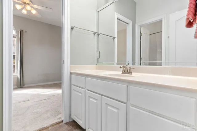 a view of a house with basketball court