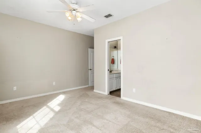 a view of a house with backyard and balcony