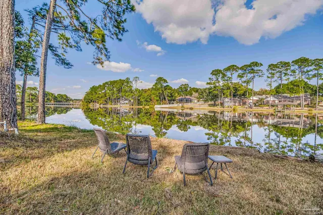 a view of a lake with a house