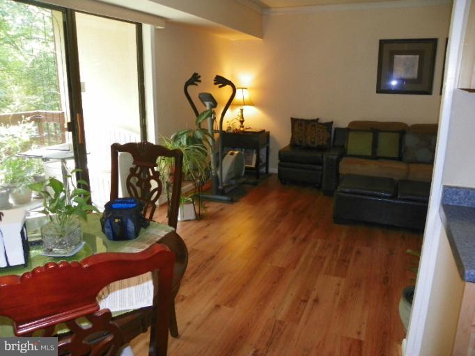2241 Castle Rock Square, Unit 12C Reston, VA 20191 - Photo 2 of 17 Living Room and dining area