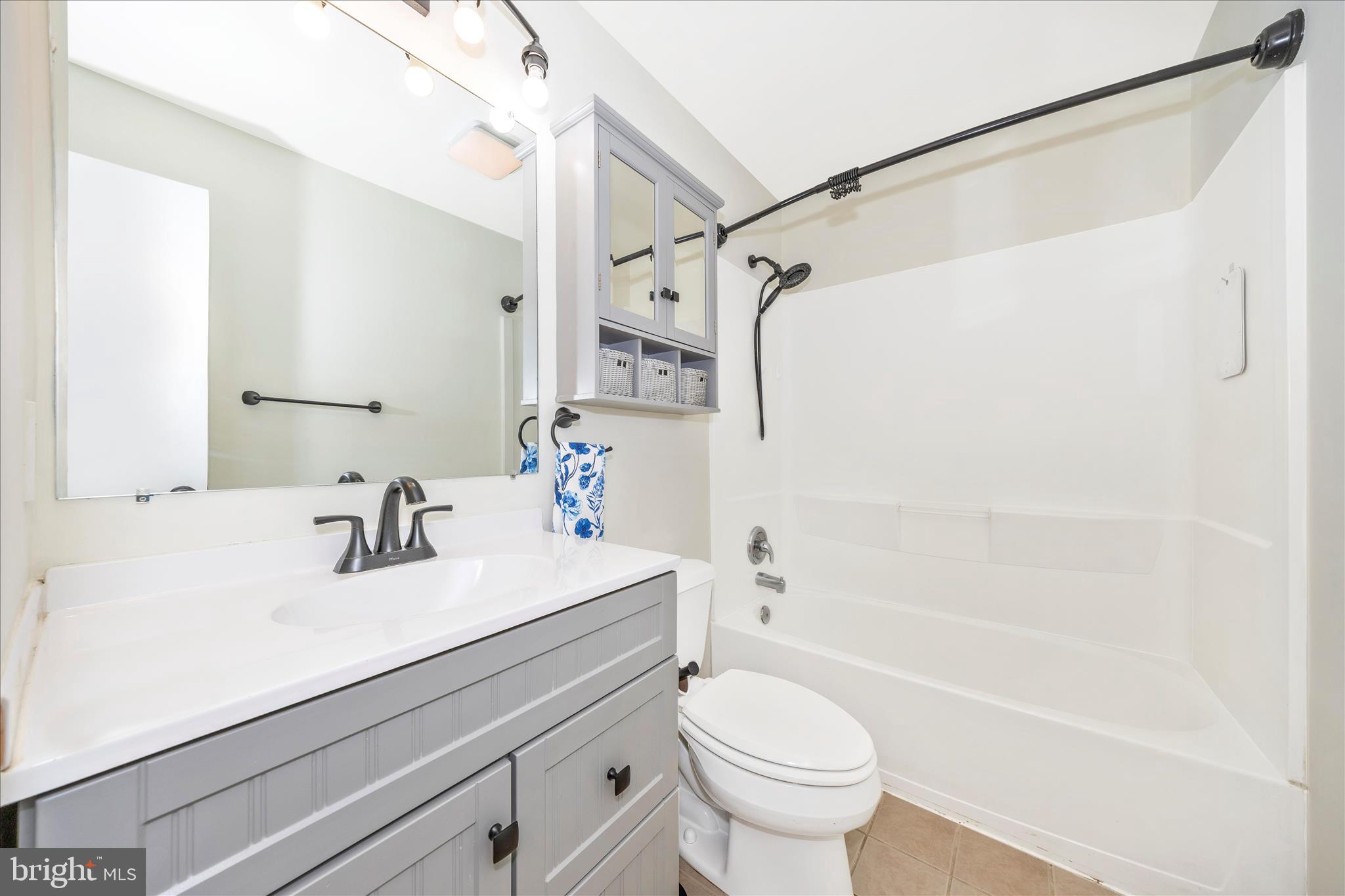 1606 Wise Road Point of Rocks, MD 21777 - Photo 28 of 67 a bathroom with a sink a toilet and a bathtub