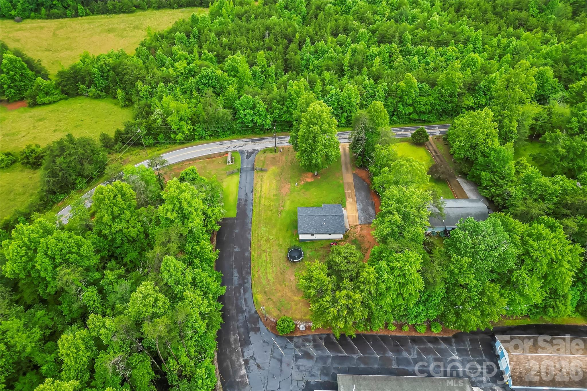 825 South Creek Road Nebo, NC 28761 - Photo 31 of 34 an aerial view of residential house with outdoor space and trees all around