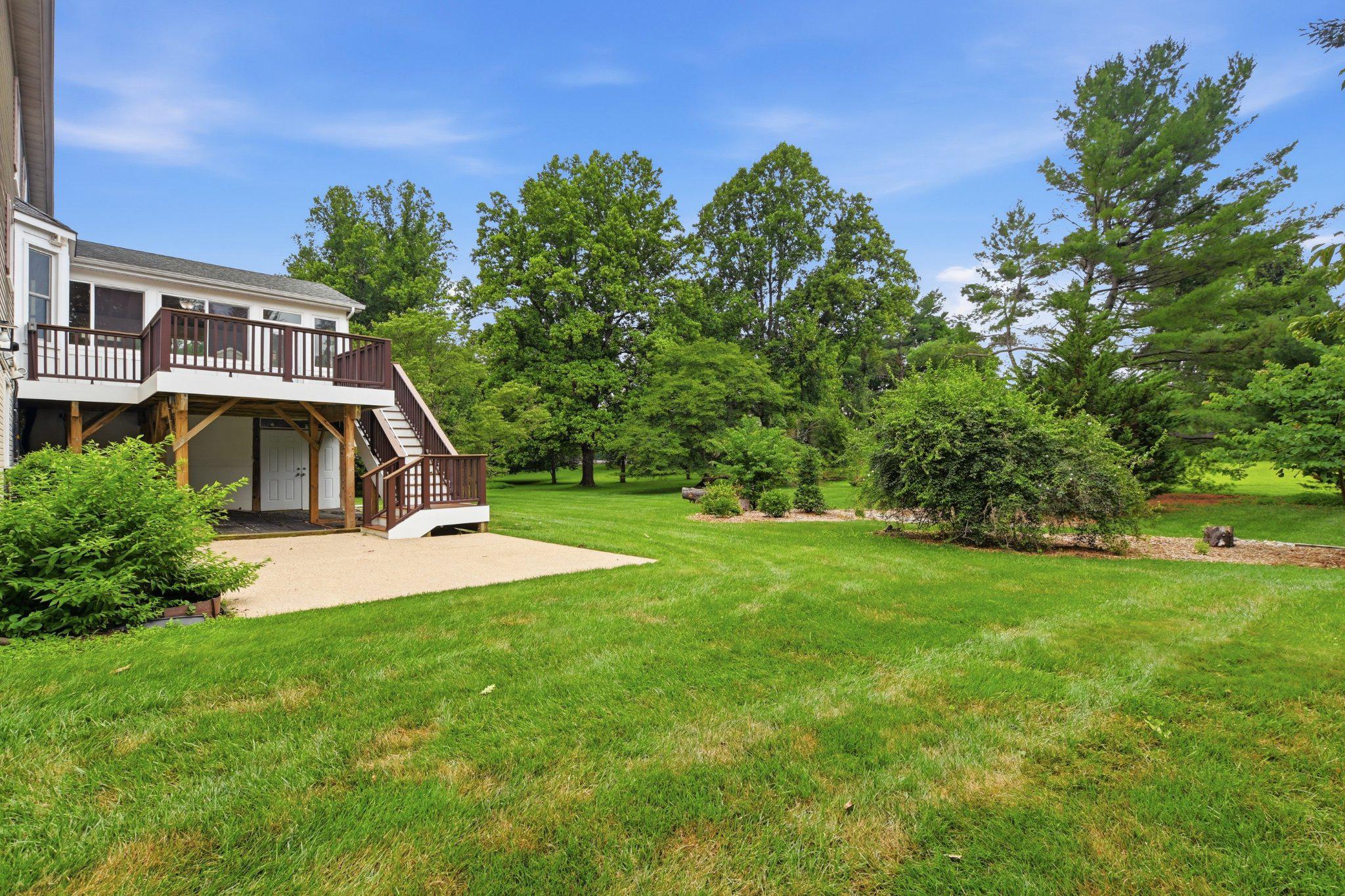 1032 Riva Ridge Drive Great Falls, VA 22066 - Photo 35 of 68 Stairs from deck leading to side patio
