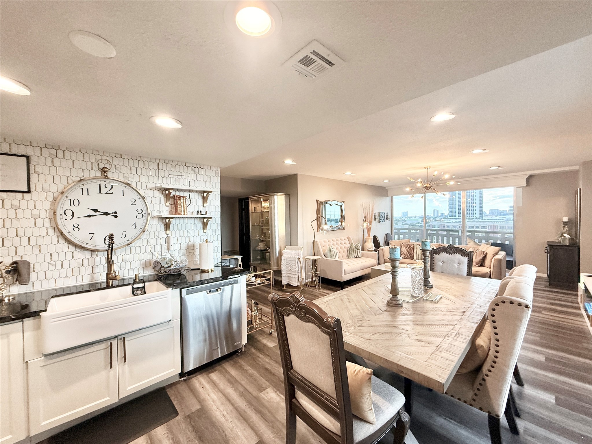 2016 Main Street, Unit 1022 Houston, TX 77002 - Photo 10 of 48 a dining room with furniture and a large window