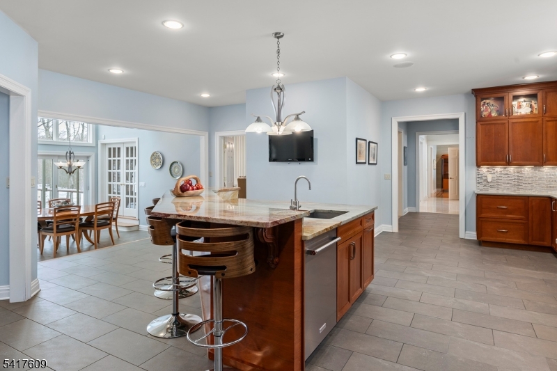 2 Cobblefield Road Mendham, NJ 07945 - Photo 12 of 50 a view of kitchen island dining table and chairs