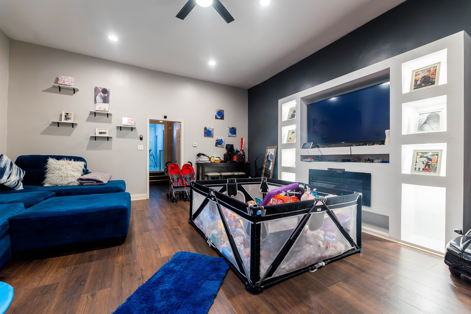 12258 South Normal Avenue Chicago, IL 60628 - Photo 2 of 21 a living room with furniture and a flat screen tv