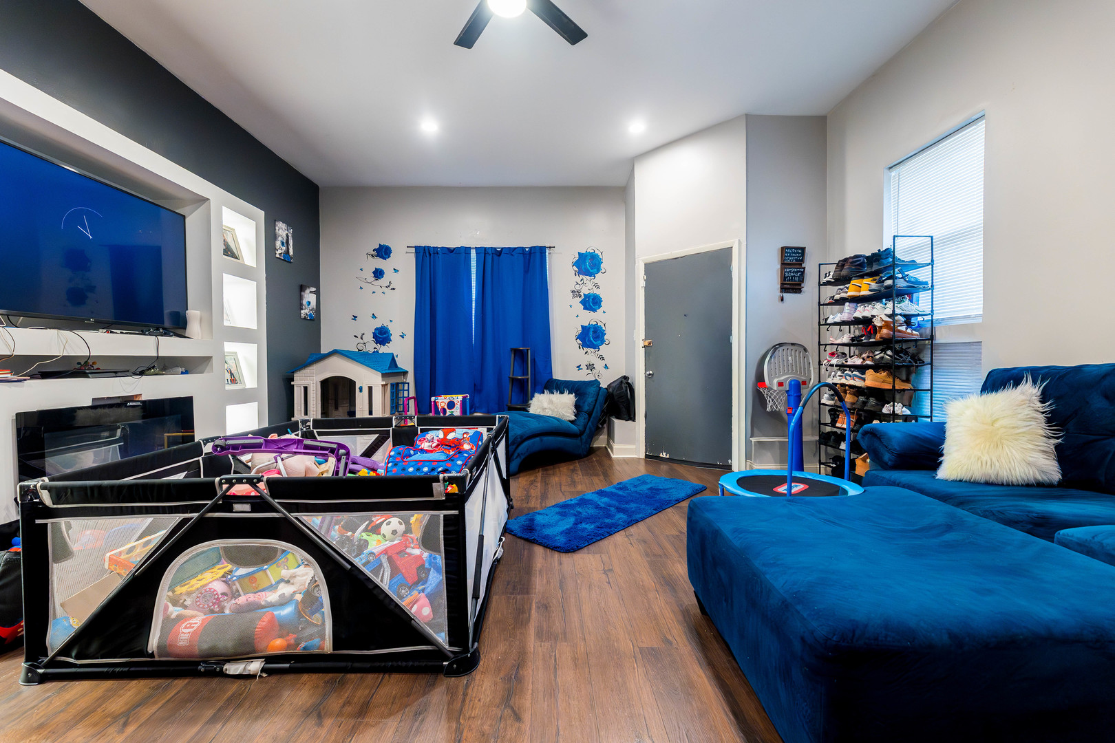 12258 South Normal Avenue Chicago, IL 60628 - Photo 4 of 21 a living room with furniture and a fireplace