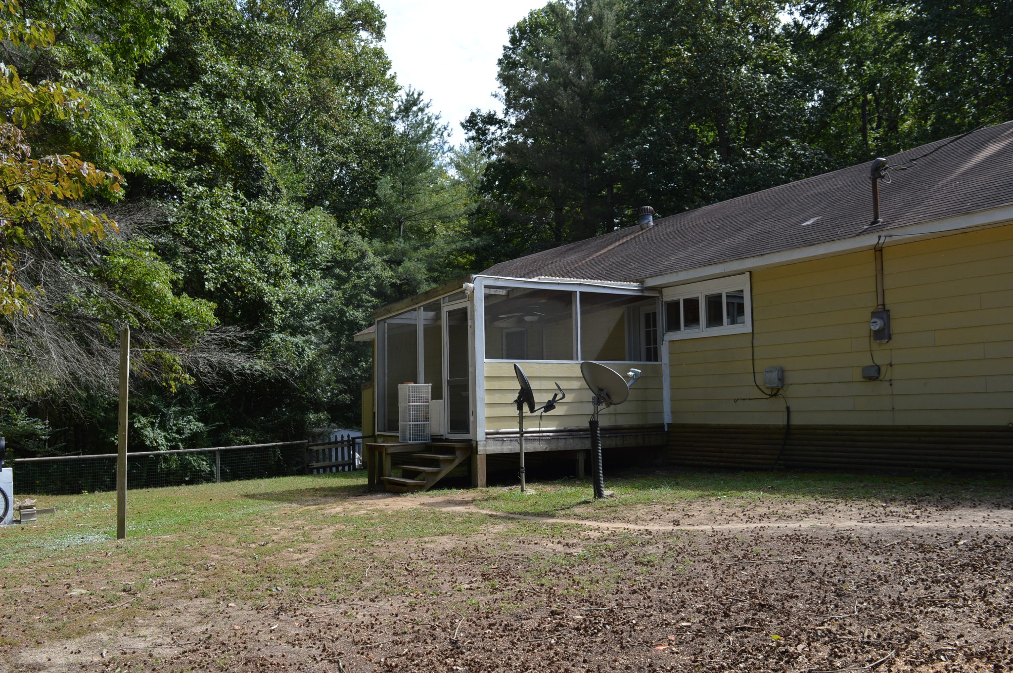 197 Midway Road Sewanee, TN 37375 - Photo 2 of 15 a backyard of a house with barbeque oven