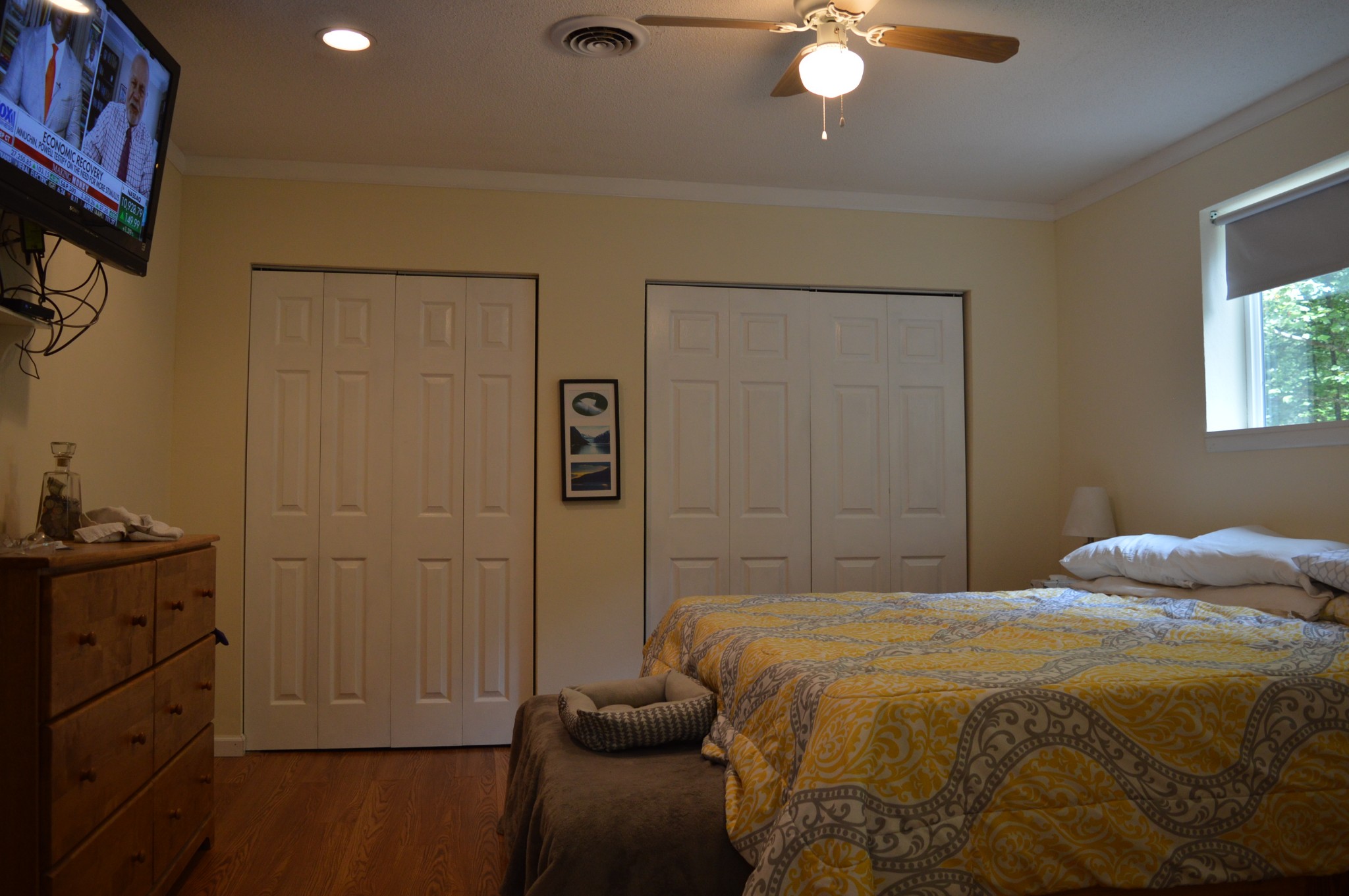 197 Midway Road Sewanee, TN 37375 - Photo 14 of 15 a bedroom with a bed and a chandelier