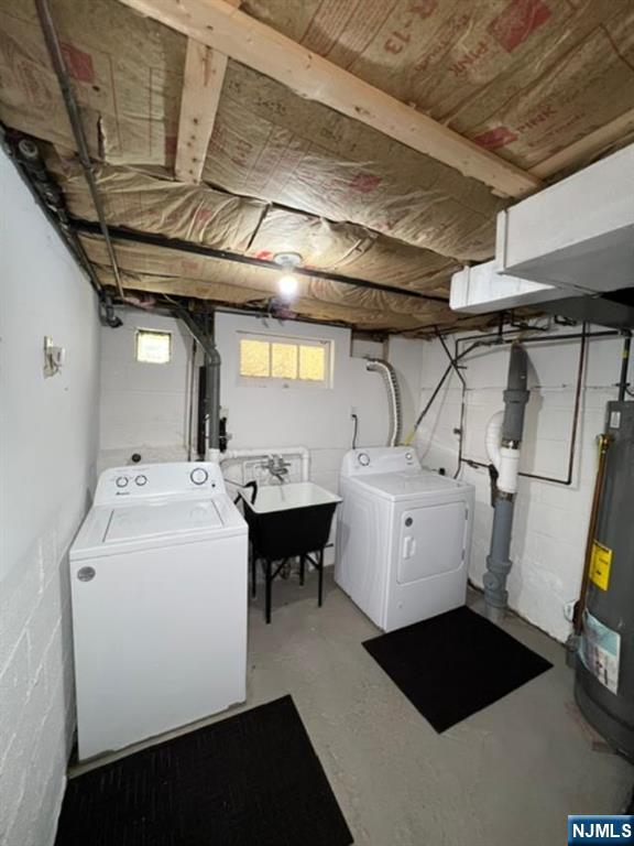 26 Donna Court Nutley, NJ 07110 - Photo 21 of 34 a utility room with dryer and washer