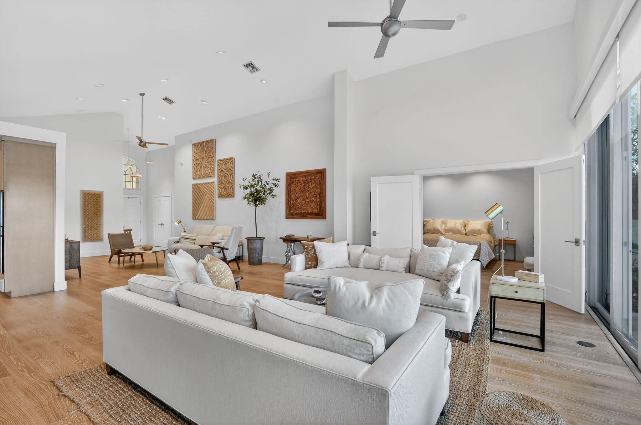 2051 Northwest 56th Street Boca Raton, FL 33496 - Photo 13 of 58 a living room with furniture and a wooden floor
