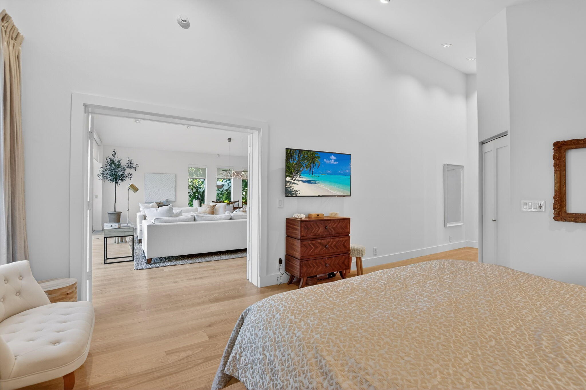 2051 Northwest 56th Street Boca Raton, FL 33496 - Photo 23 of 58 a bedroom with a bed and a couch