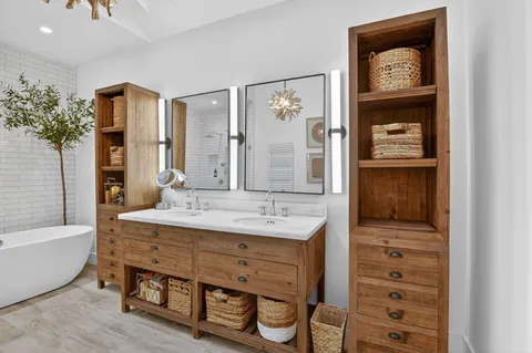 a large bed in a white room