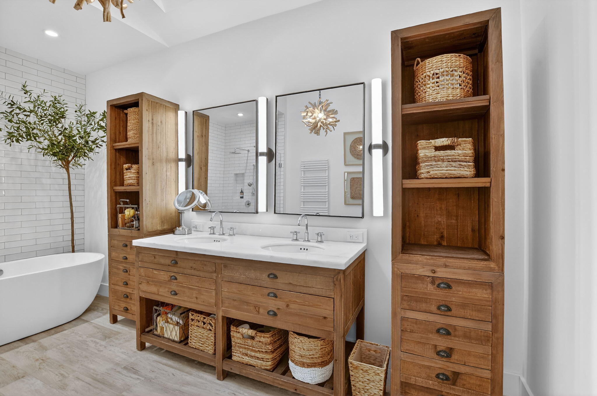 2051 Northwest 56th Street Boca Raton, FL 33496 - Photo 27 of 58 a bathroom with a sink a mirror and a bathtub
