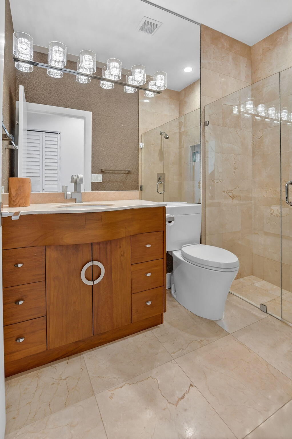 2051 Northwest 56th Street Boca Raton, FL 33496 - Photo 33 of 58 a bathroom with a double vanity sink toilet and shower