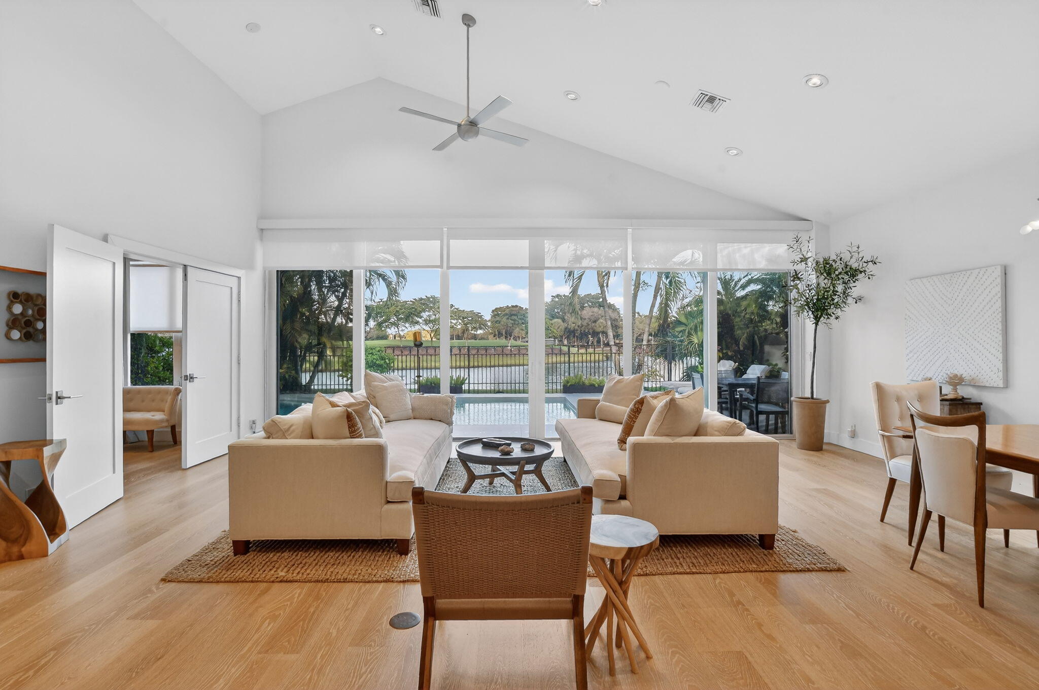 2051 Northwest 56th Street Boca Raton, FL 33496 - Photo 9 of 58 a living room with furniture and a large window